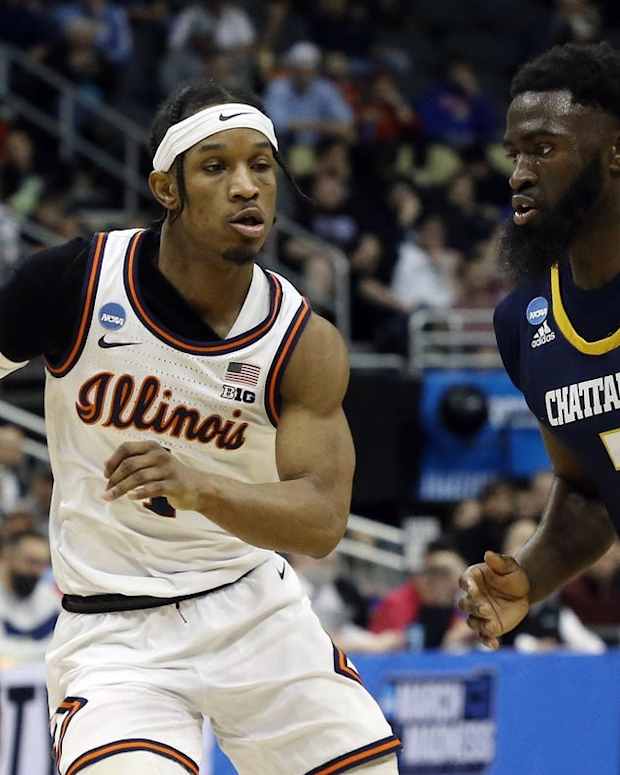 Mar 18, 2022; Pittsburgh, PA, USA; Chattanooga Mocs guard David Jean-Baptiste (3) drives to the basket against Illinois Fighting Illini guard Trent Frazier (1) during the first round of the 2022 NCAA Tournament at PPG Paints Arena. Mandatory Credit: Charles LeClaire-USA TODAY Sports